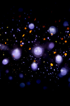 Dunkler Hintergrund mit verschwommenen bunten Lichtern