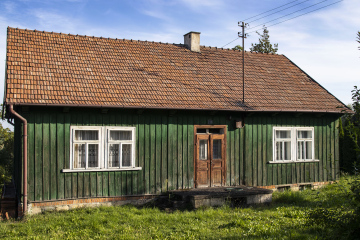 Hölzernes grünes Landhaus