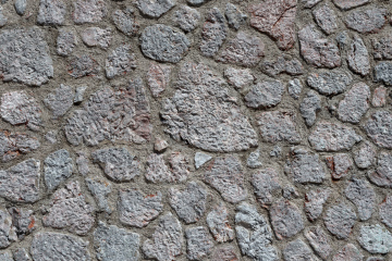 Wand mit Granitsteinen